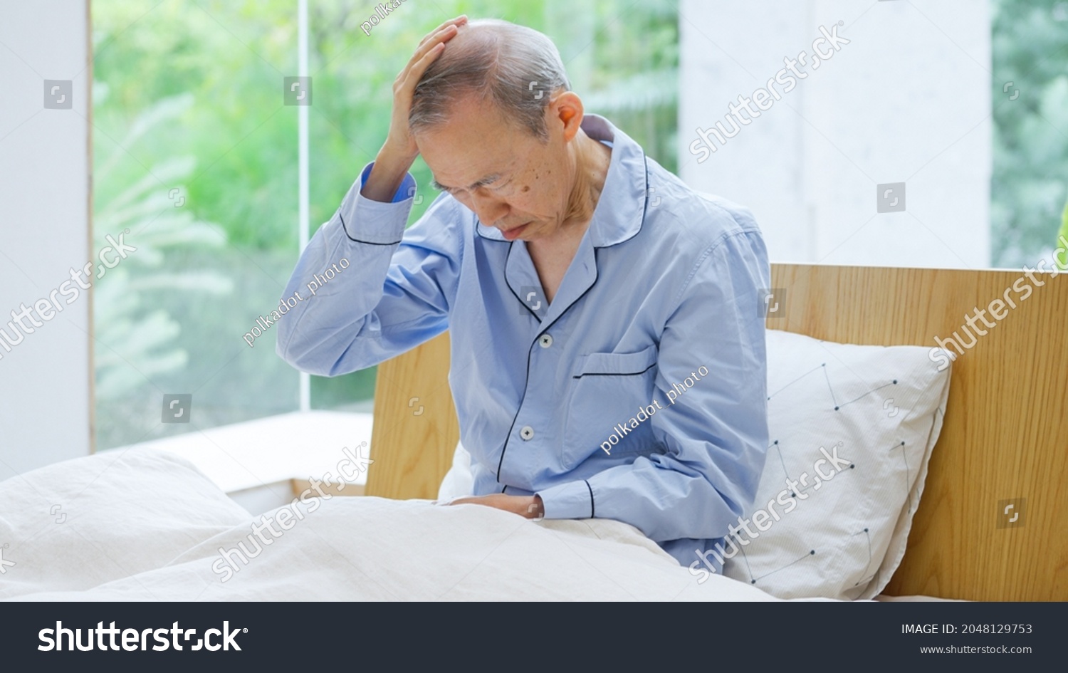 Asian senior man who is sick