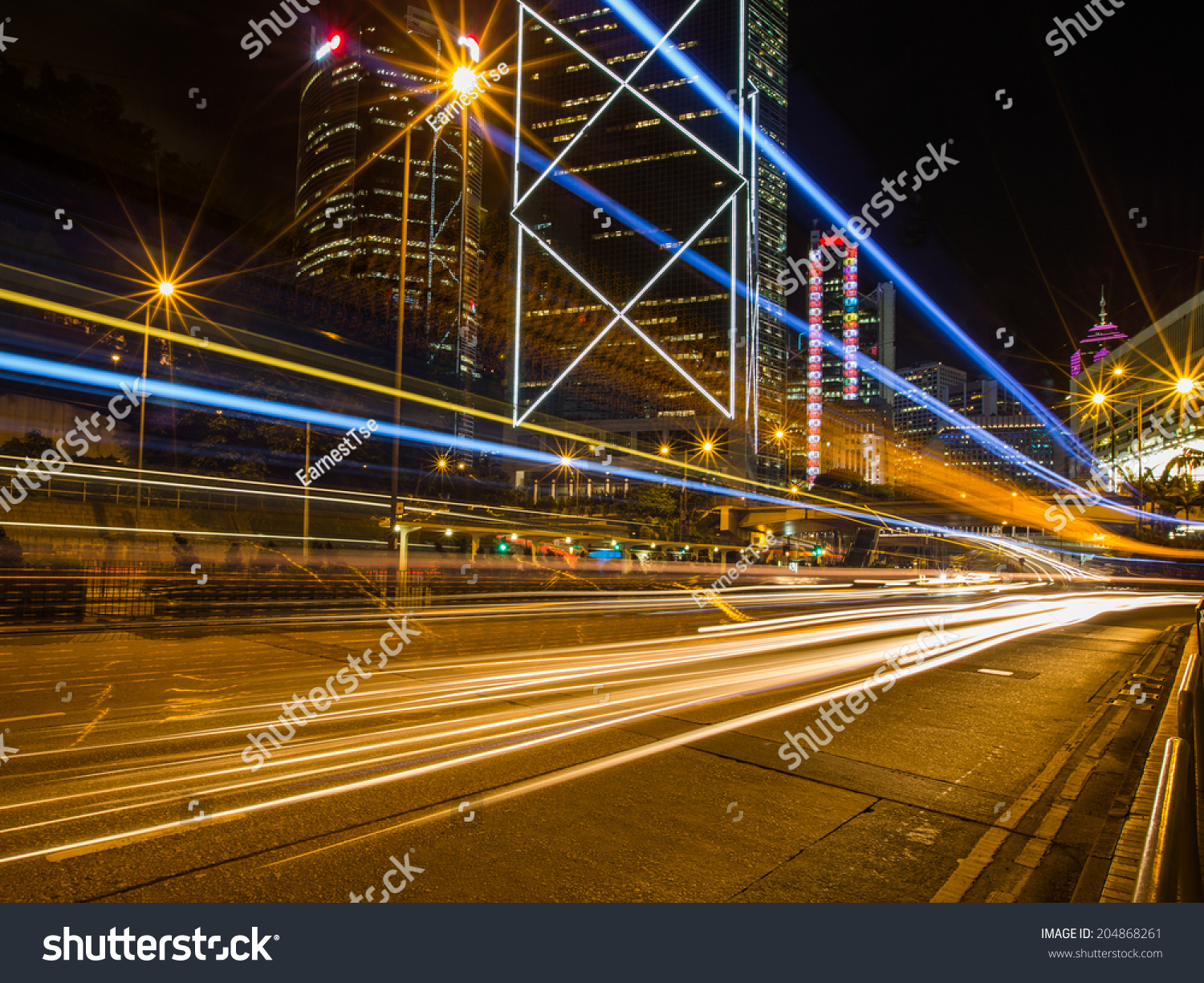 Hong Kong Business District at Night with Light Track