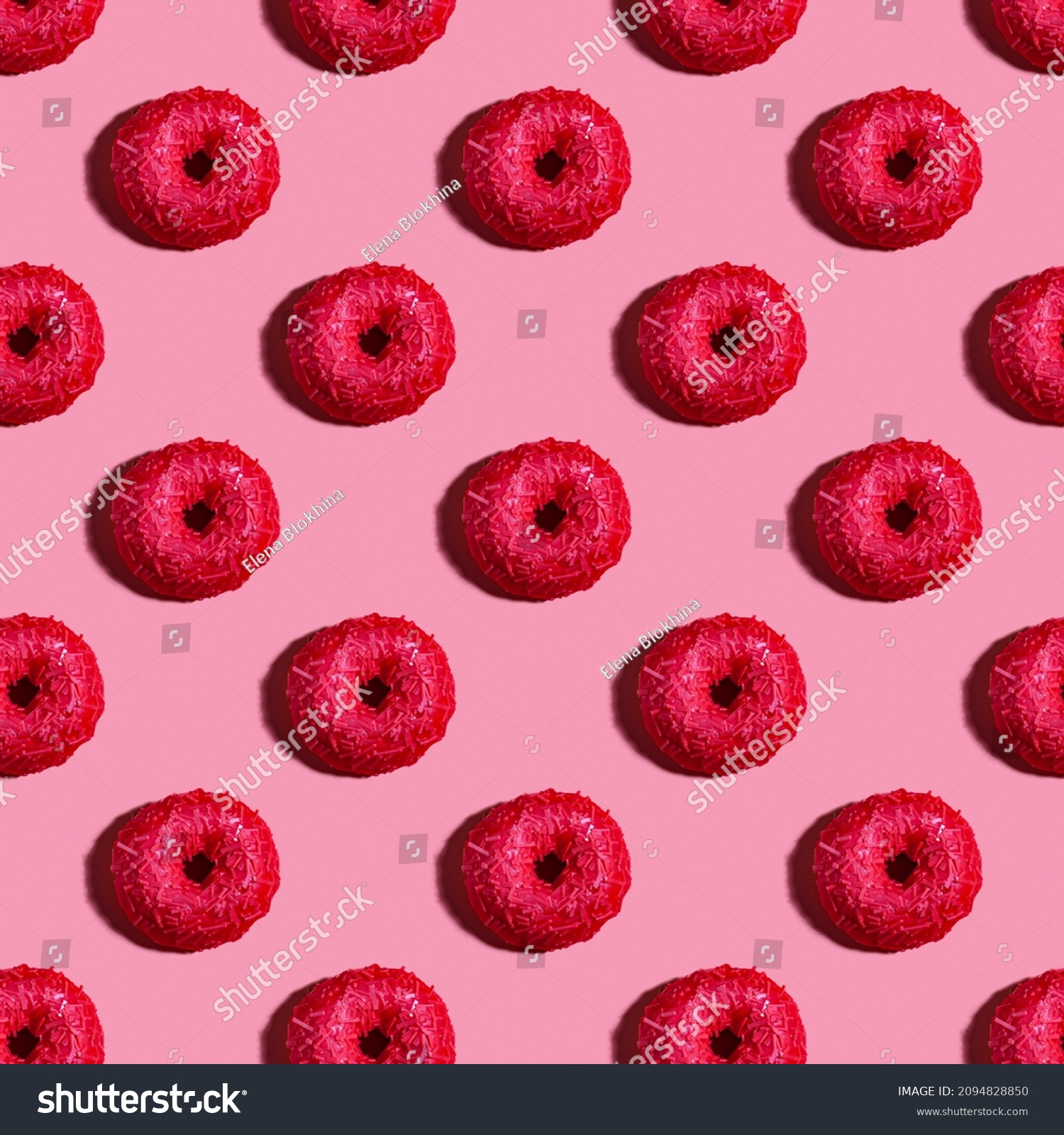 Seamless background with red raspberry donut. Pink pattern.