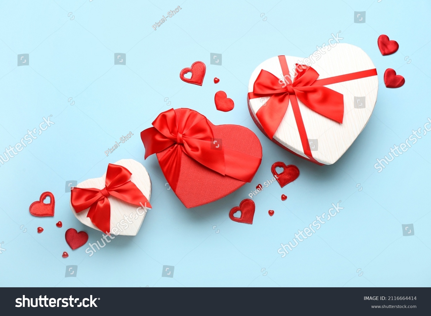 Gift boxes for Valentine's Day on blue background