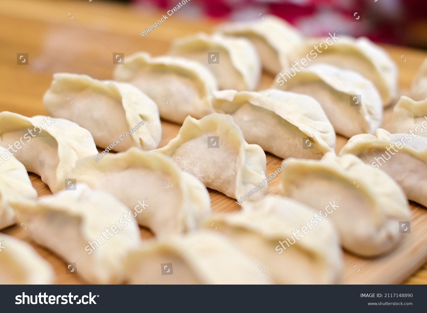 A closeup of dumplings in a row