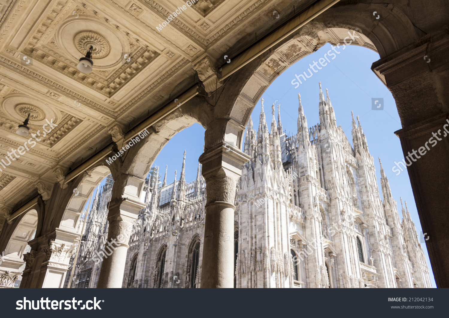 Duomo cathedral of Milan  Italy. look from the arcade portico.  