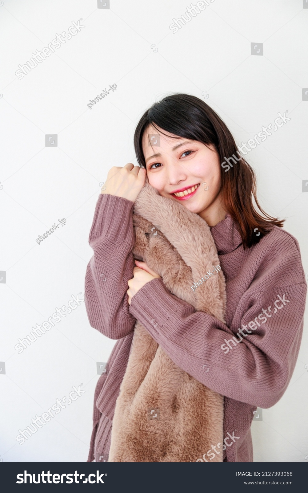 Japanese woman in winter clothes and white background