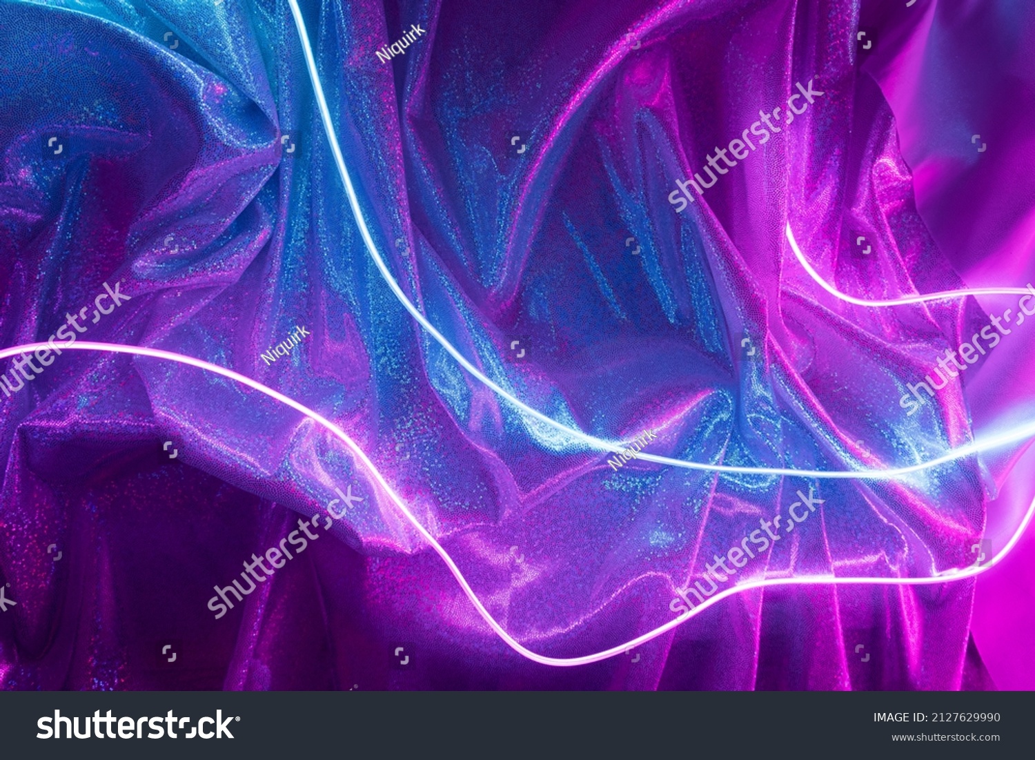 Pink and blue neon lights with glitter fabric background. Cyberpunk futuristic template.
