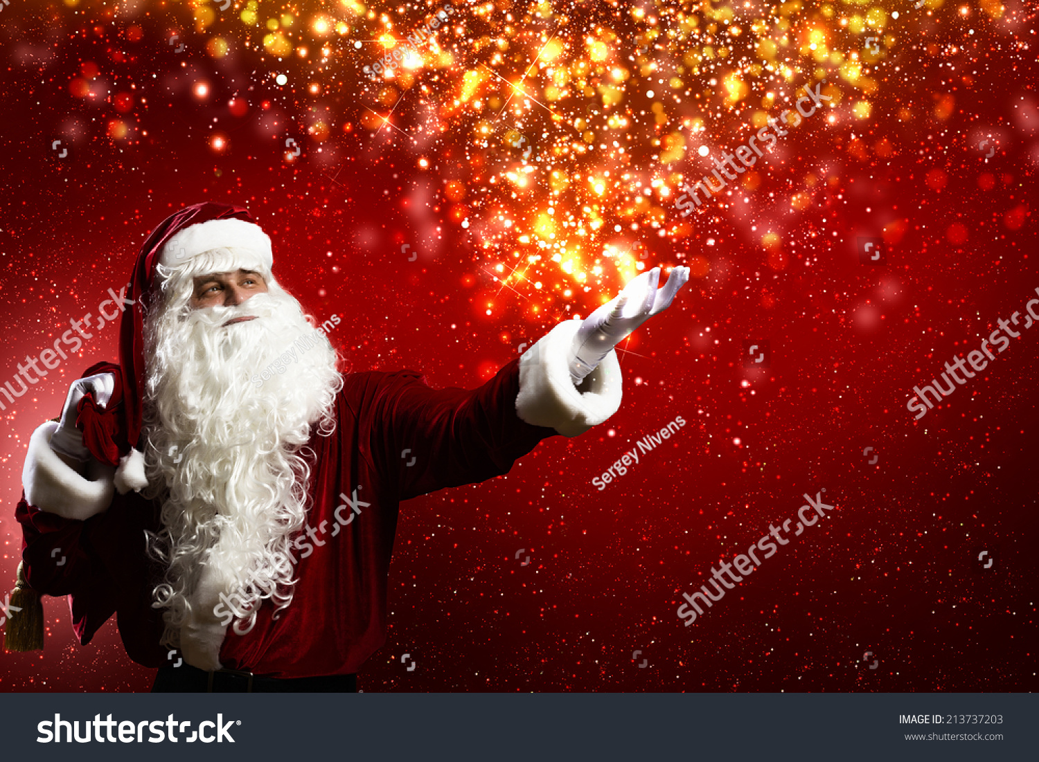Santa Clause with gift bag behind shoulders