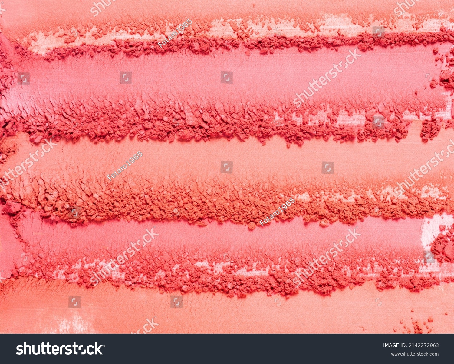 Blusher or pressed powder pink orange peach textured background