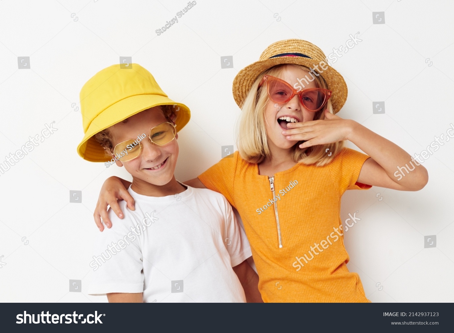 funny kids boy and girl hugging fashion childhood