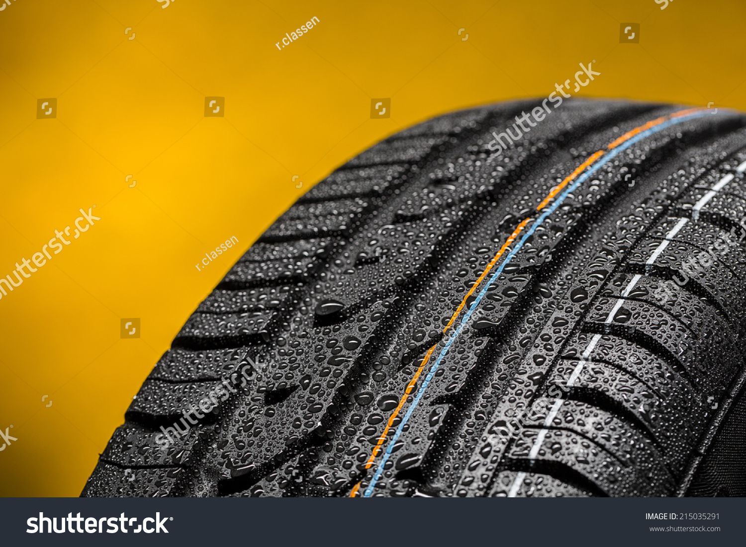 Car tire with raindrops summer tire aquaplaning