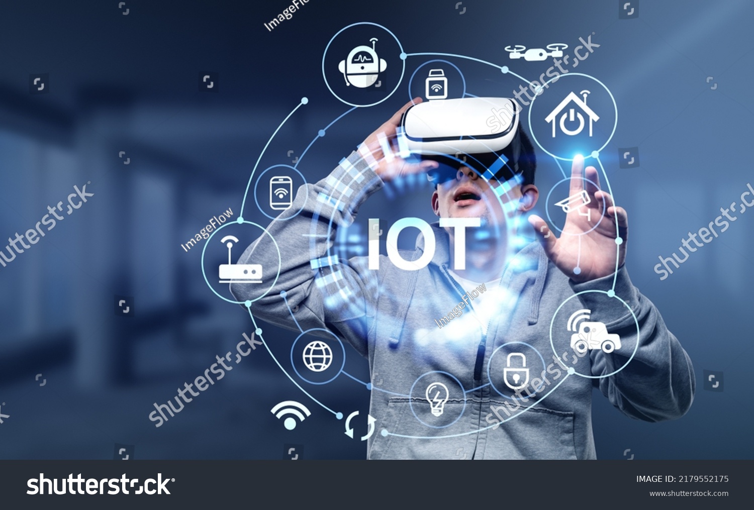 Young man in vr headset finger touch virtual screen with internet of things hud connection and network hud. Concept of modern technology and interface