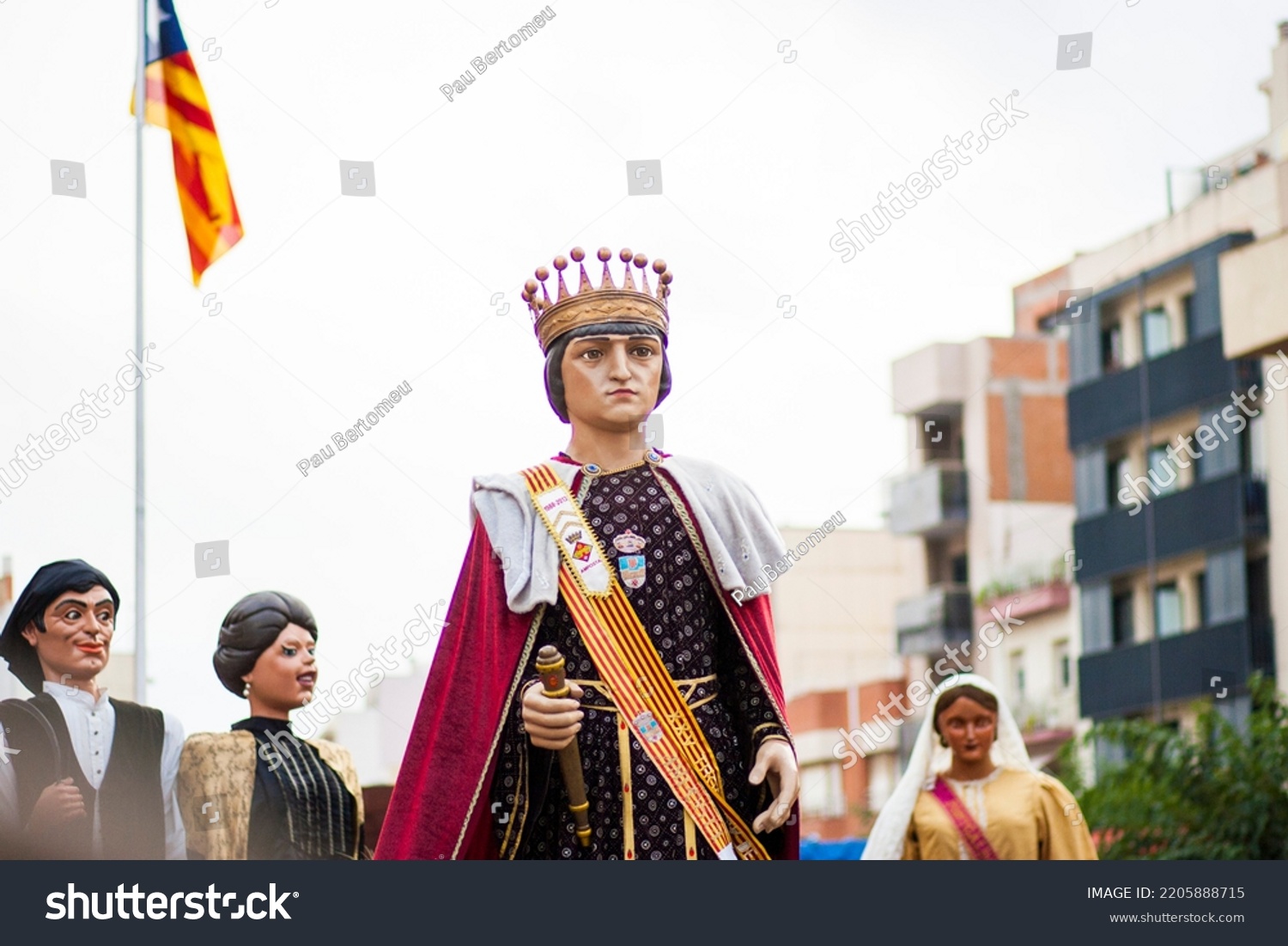 village festivals with wooden giants and big heads