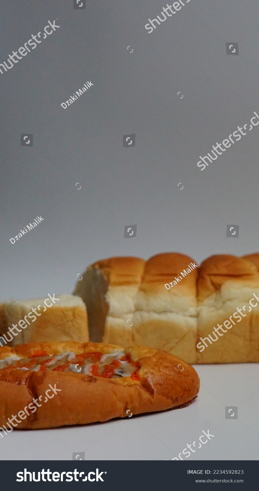 bread made of flour on a white background. delicious wheat bread