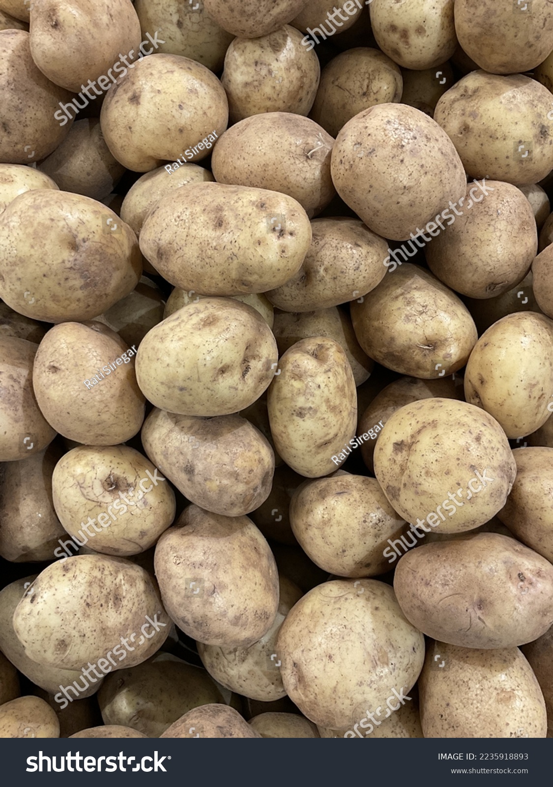 fresh potatoes in a market