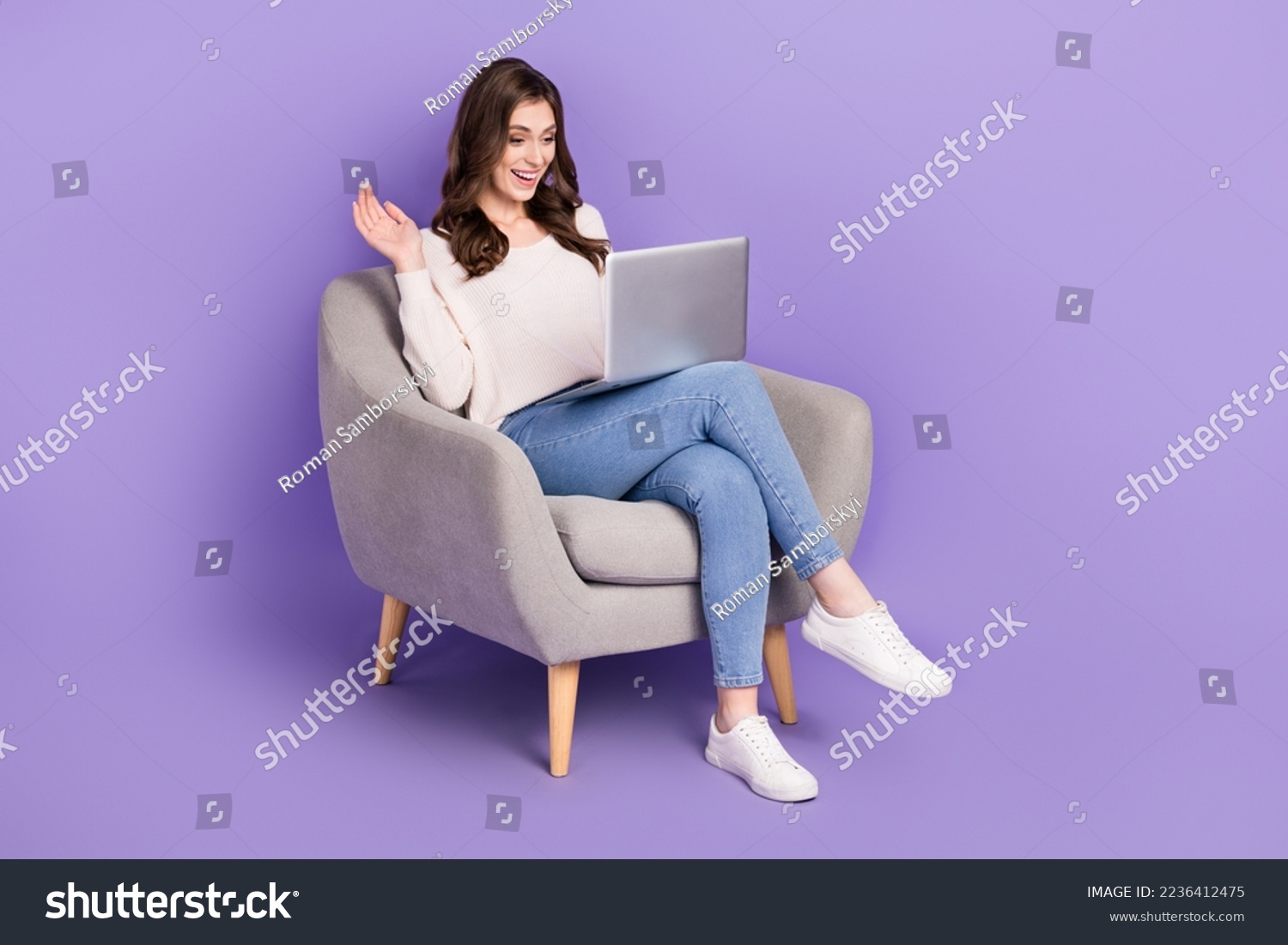 Photo of overjoyed lady hold netbook video call telegram twitter instagram messenger empty space isolated on purple color background