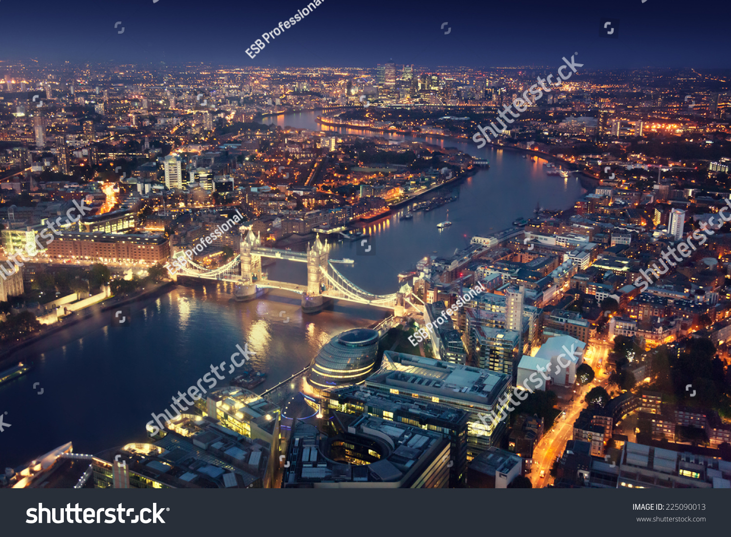 London at night with urban architectures and Tower Bridge