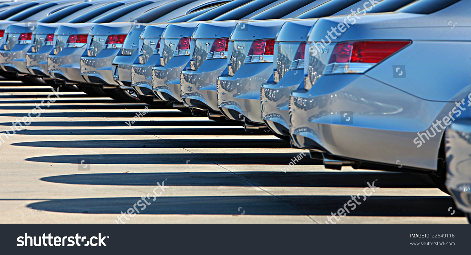 Shiny cars standing on parking lot