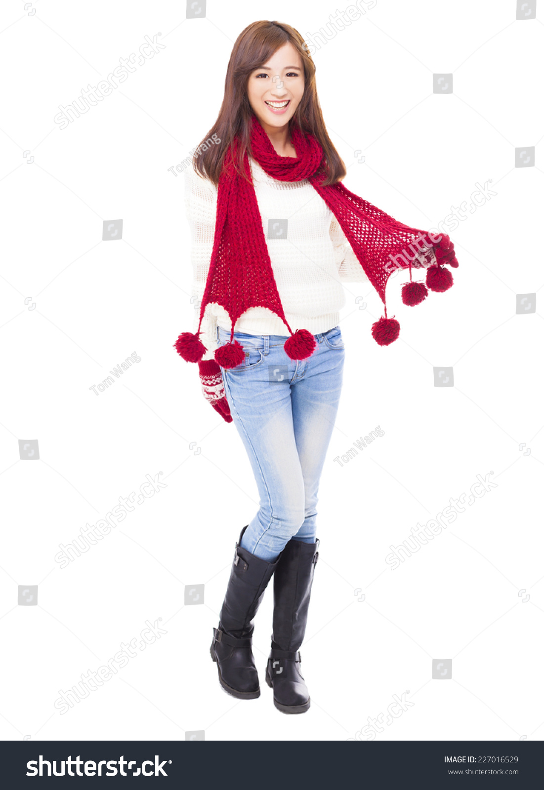 happy young beautiful woman in winter clothes isolated on white background