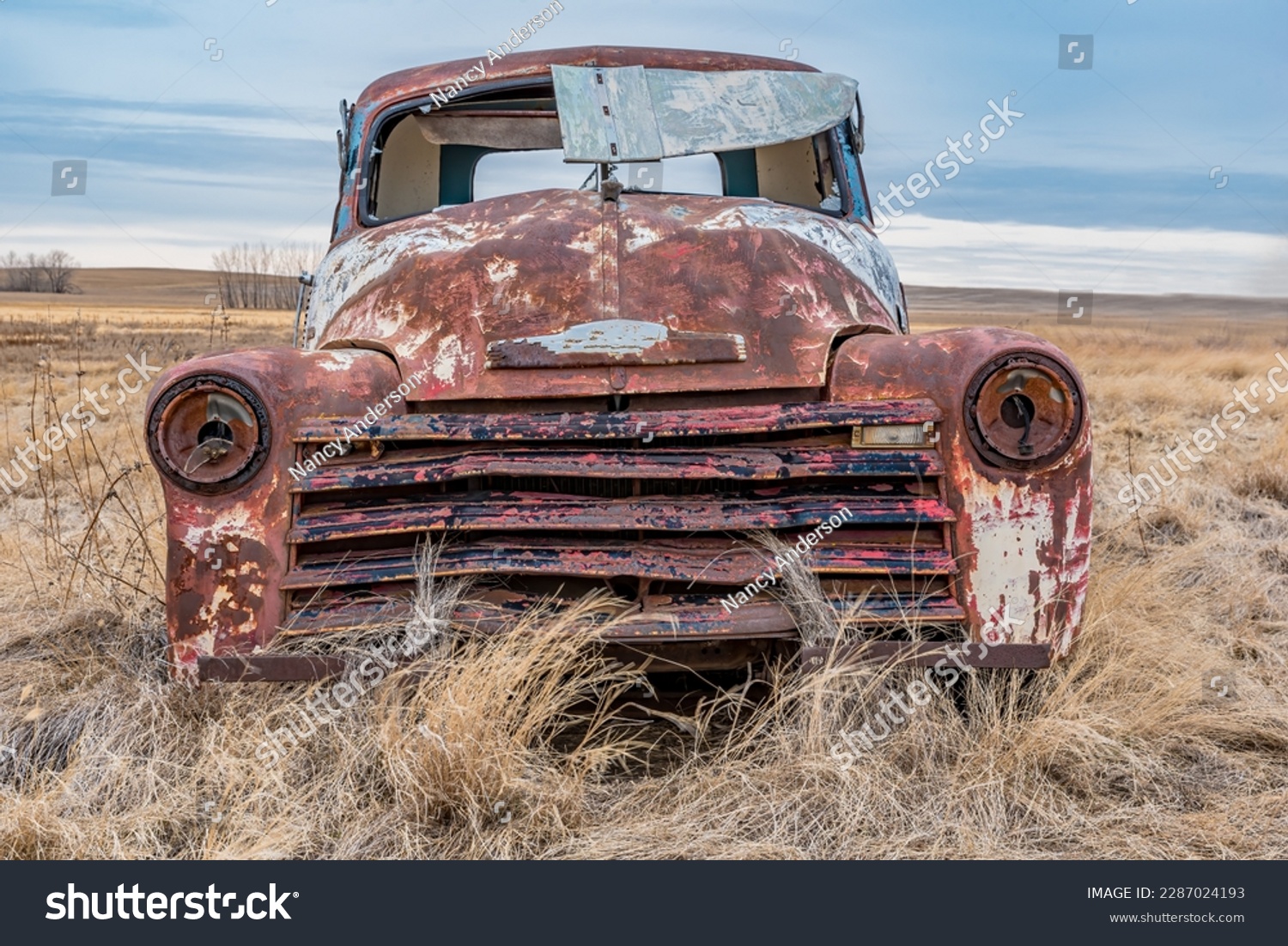 a vintage half ton pickup truck abandoned on the saskatchewan