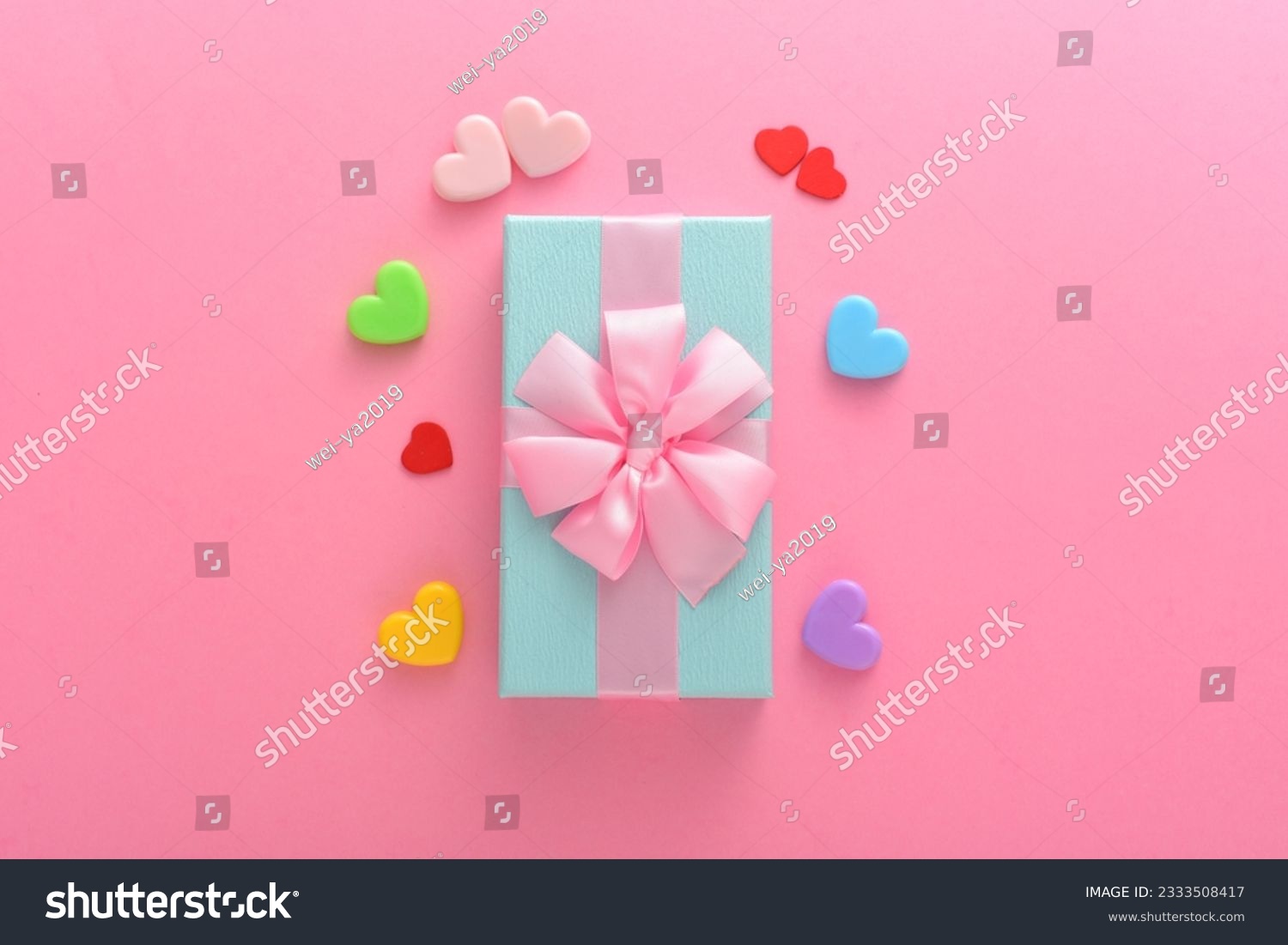 Love gift box on a pink background