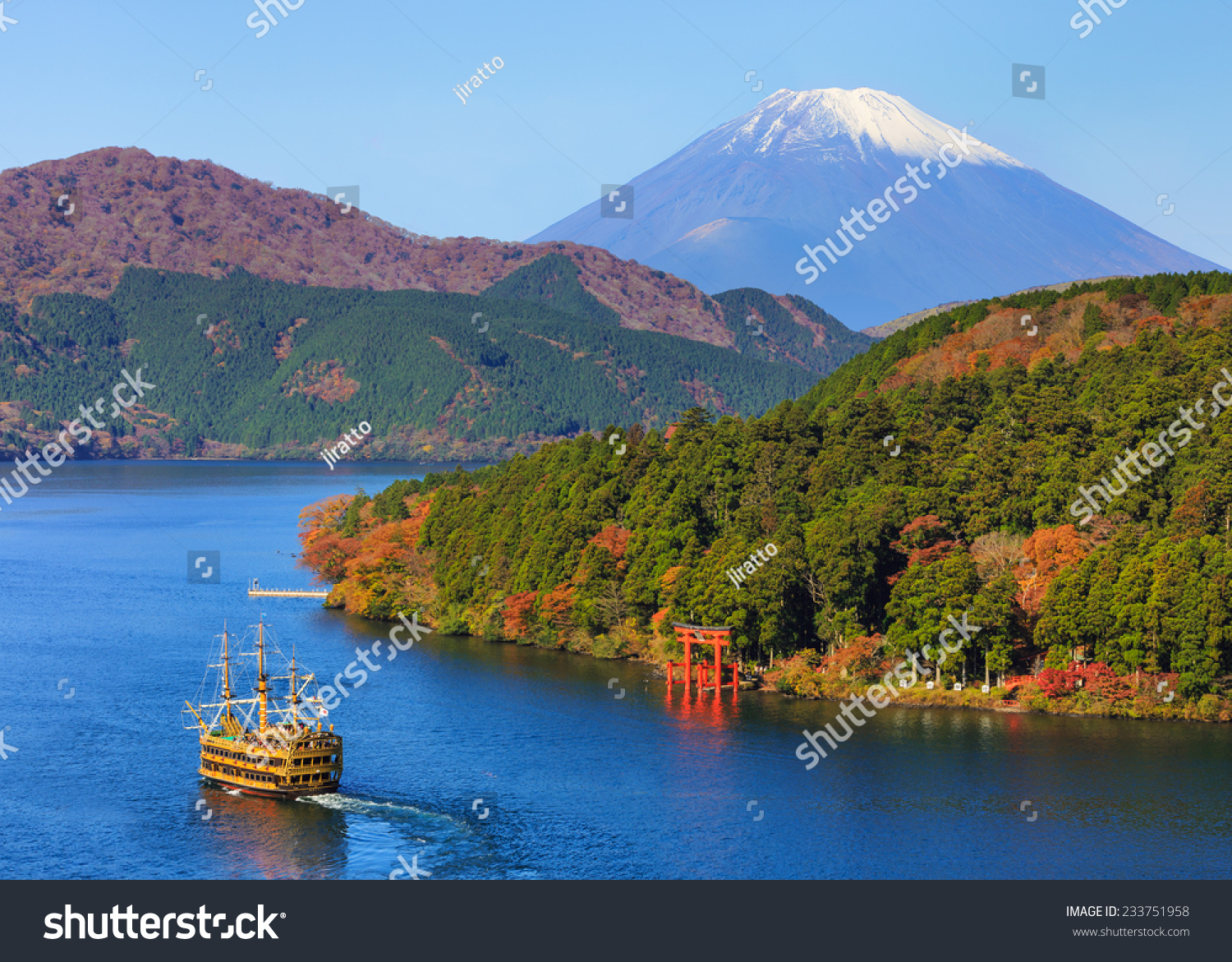 Mountain Fuji and Lake Ashi with Hakone temple and sightseeing boat in autumn