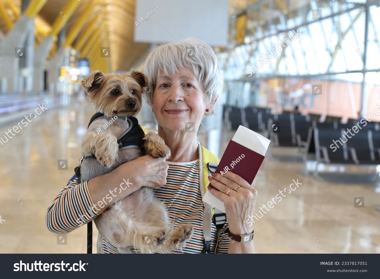 Senior woman traveling with her dog 