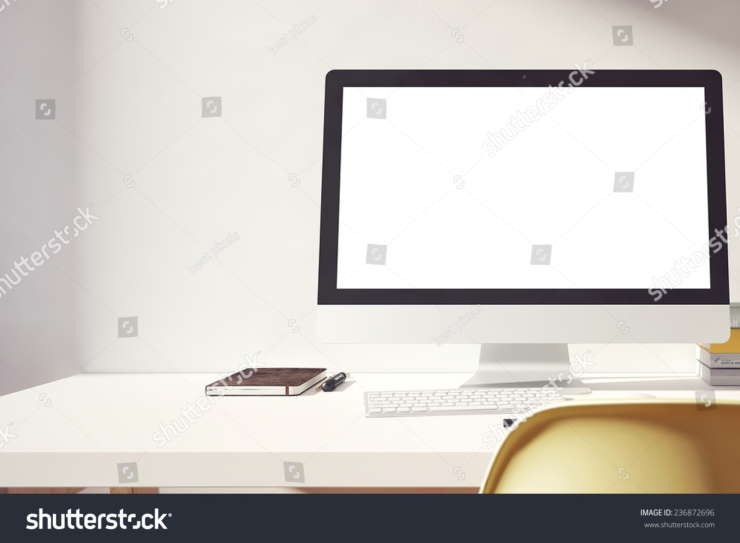 the computer is on the table in a bright interior