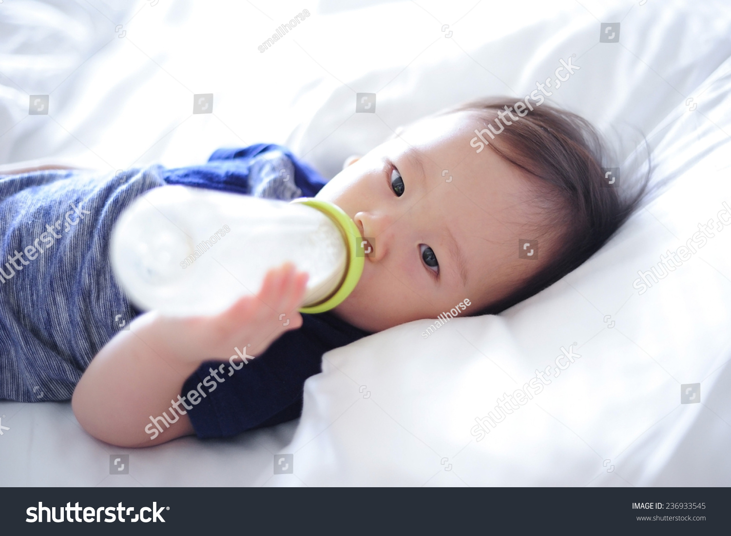 Baby Drinking Milk from Bottle