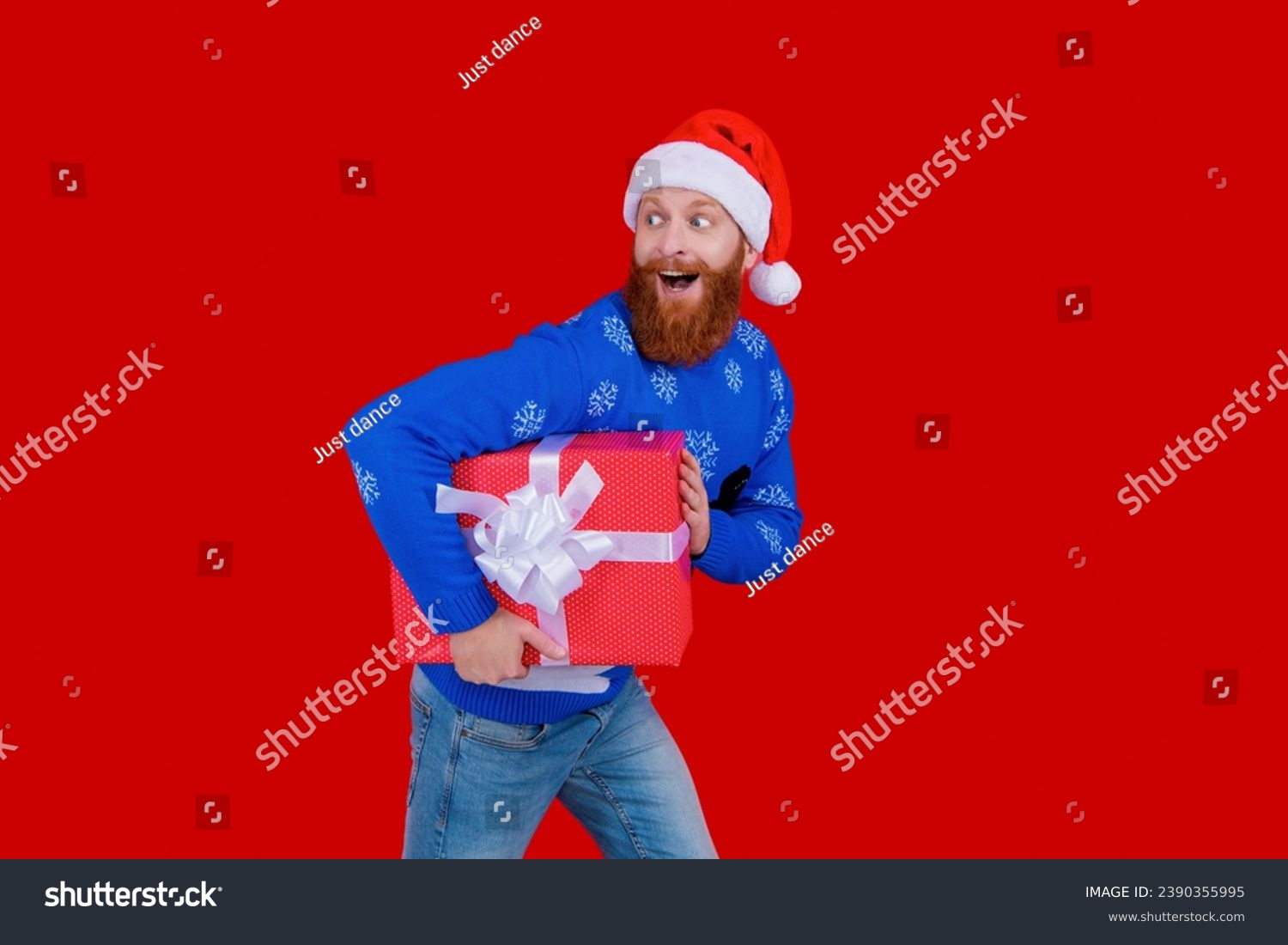 Santa man hold holiday shopping gift. Xmas present and gift. Christmas shopping sale. Happy New Year. Xmas holiday present. Santa Claus man hurry for New Year sale. Send Christmas cards