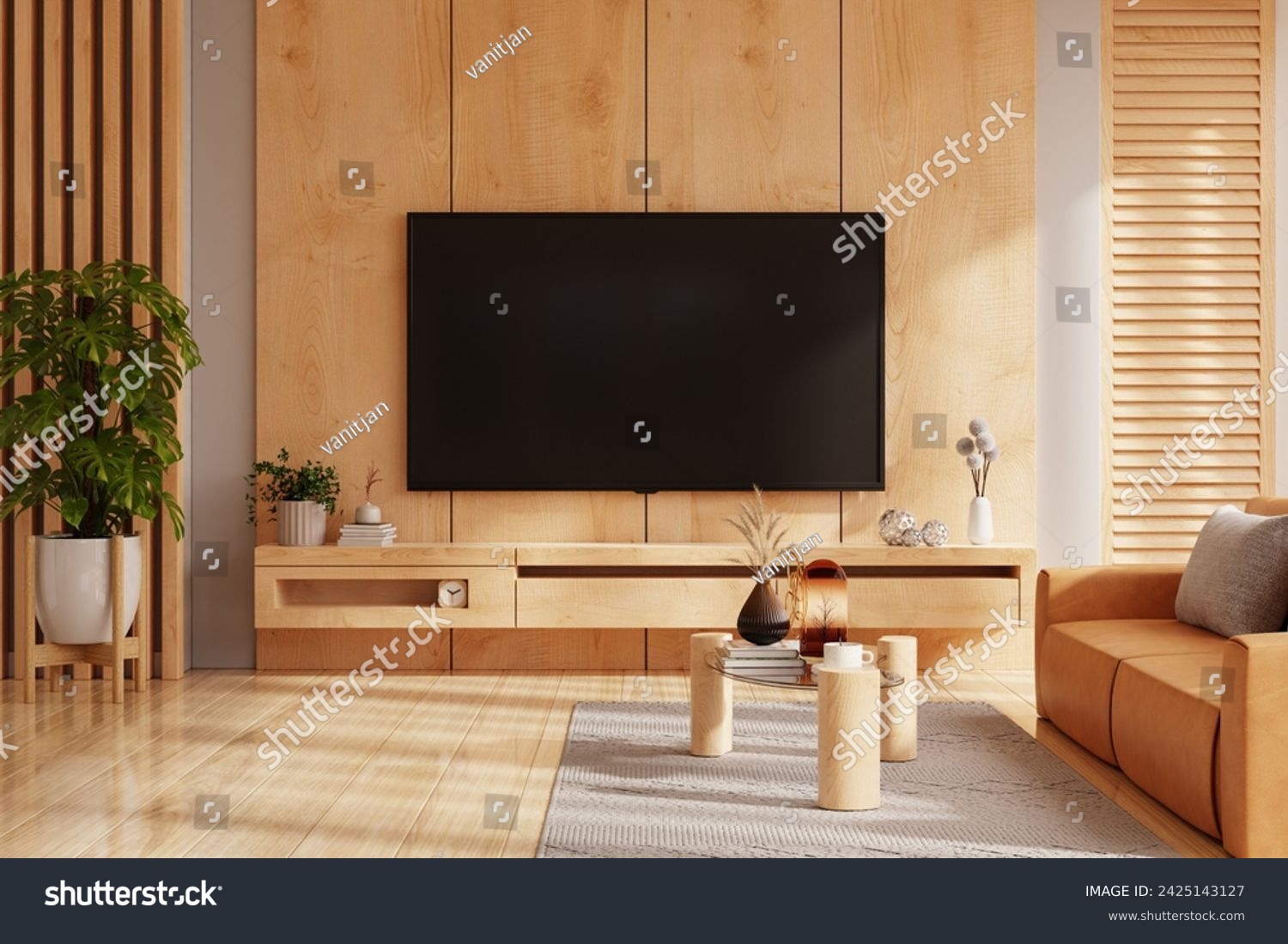 Wooden wall mounted tv on in living room with leather sofa and