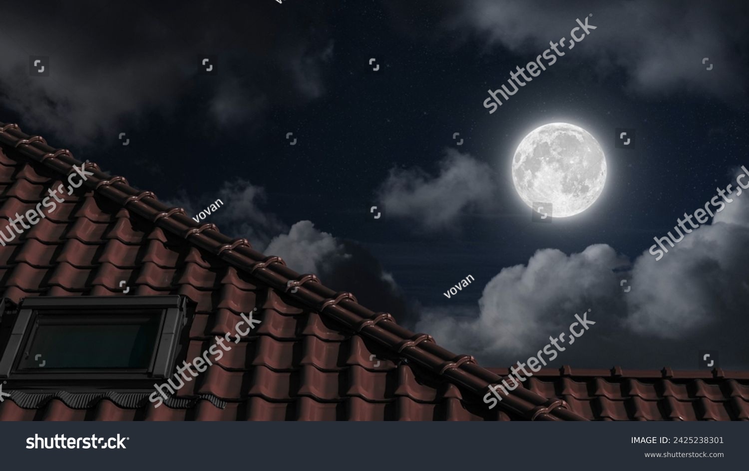 roof of the house under the night blue sky