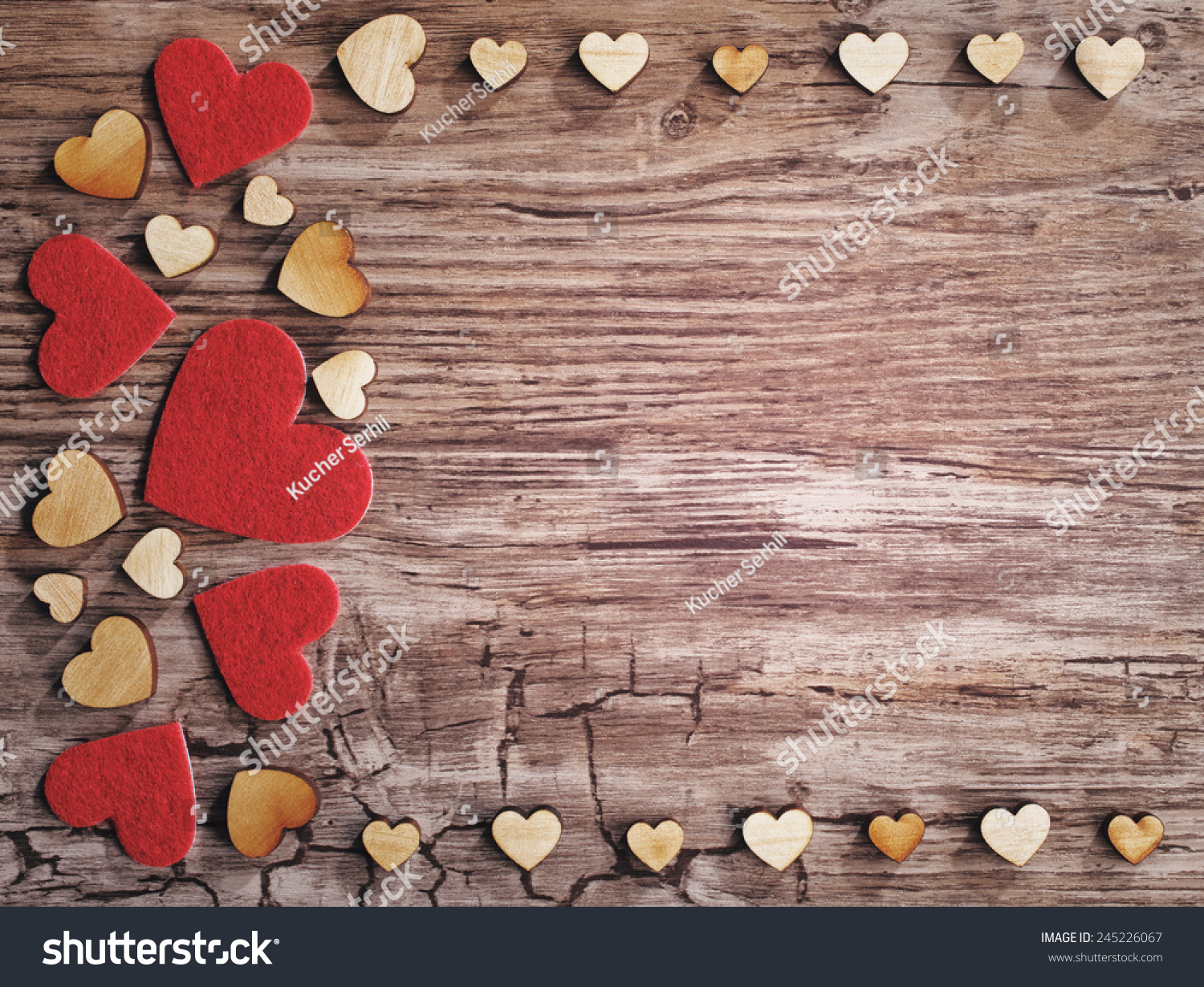 hearts on old wooden background