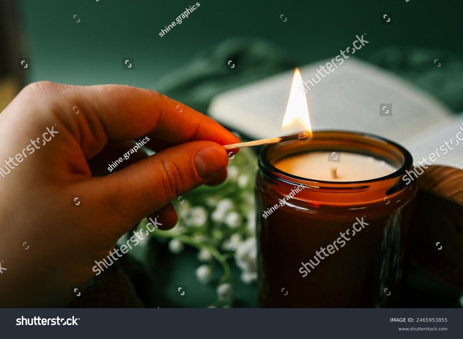 Girl lights a candle  spring aesthetics.