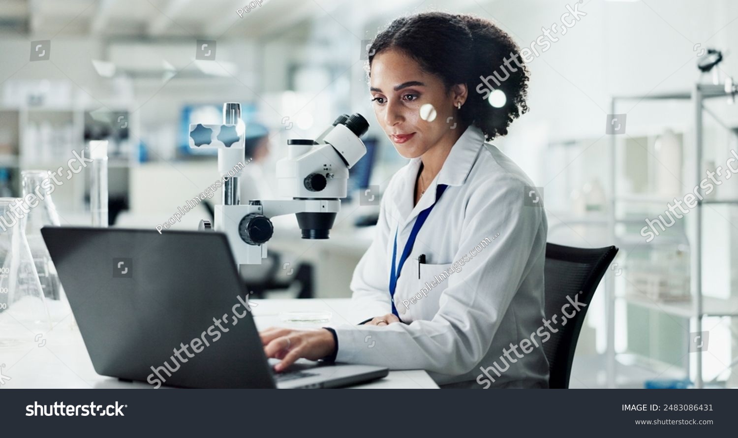 Research laptop and woman in lab microscope and testing with science experiment biotech and medicine. Results researcher and employee with equipment pc or study with sample analysis or medical