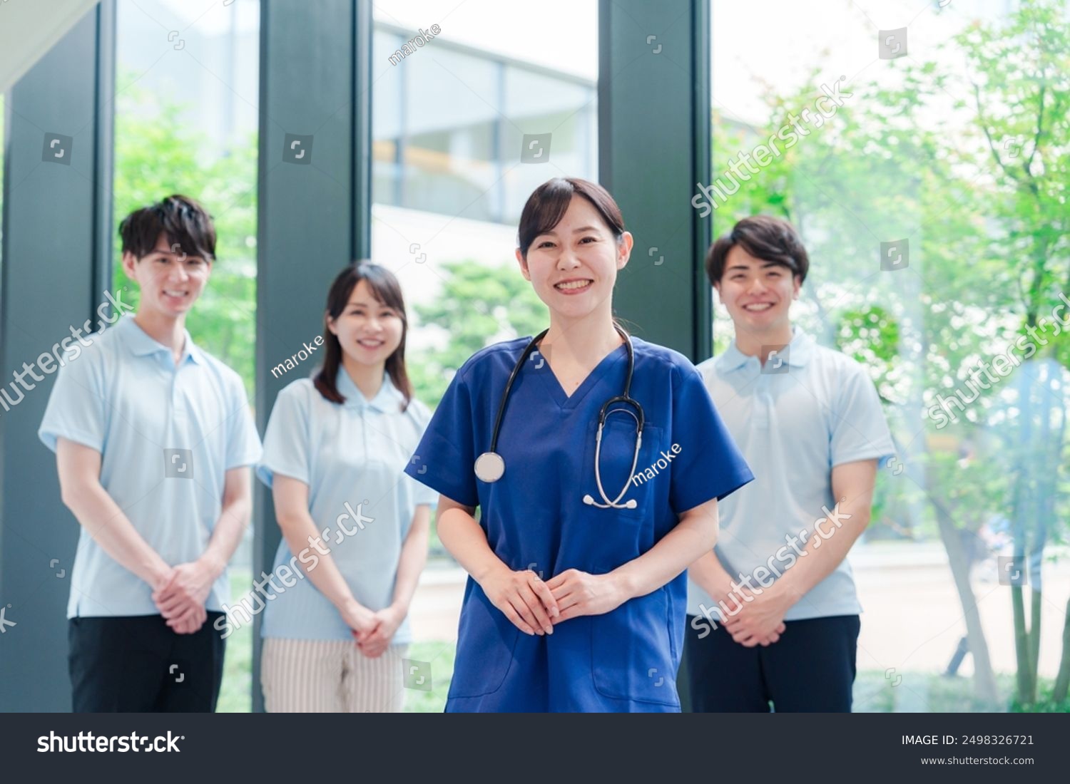 Smiling doctors and medical staff