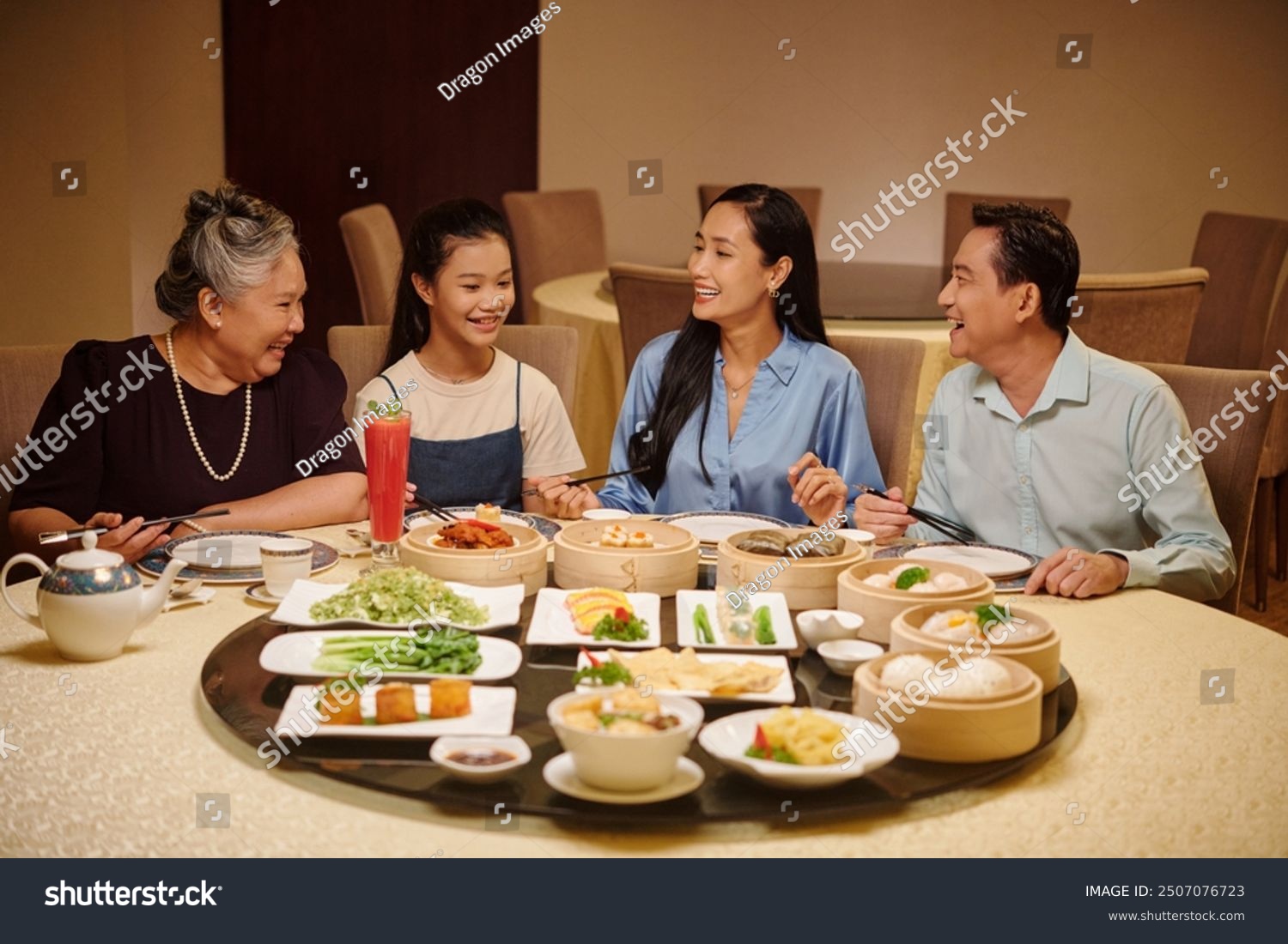 Family Having Meeting In The Restaurant