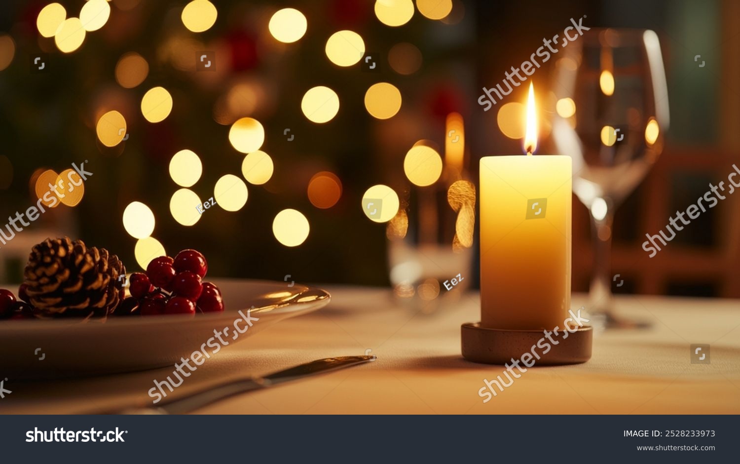 Soy candle in a minimalist holder  setting a warm holiday mood at dinner. Soft candlelight from a minimalist soy candle adds warmth to holiday table decor.