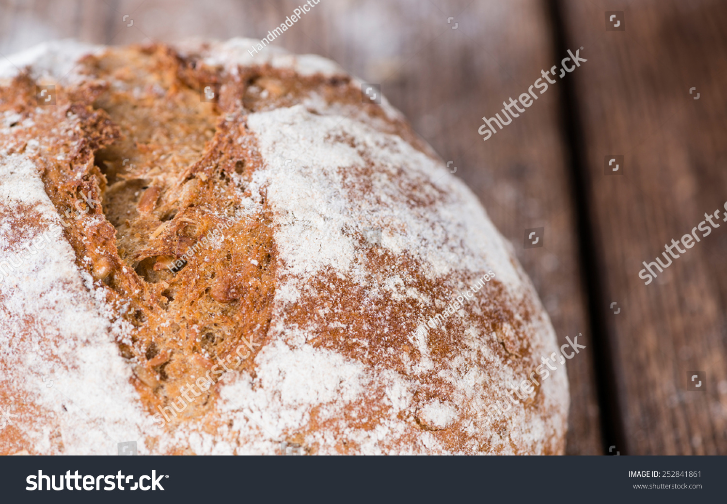 Fresh baked Loaf of Bread (as detailed close-up shot)