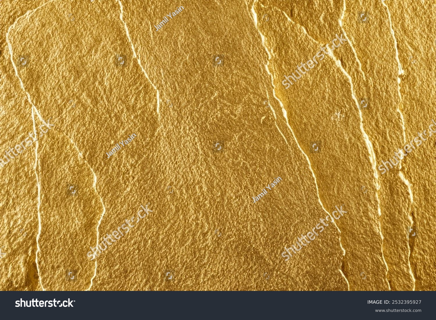Abstract gold texture background with laser-etched rock wall golden color top view close-up