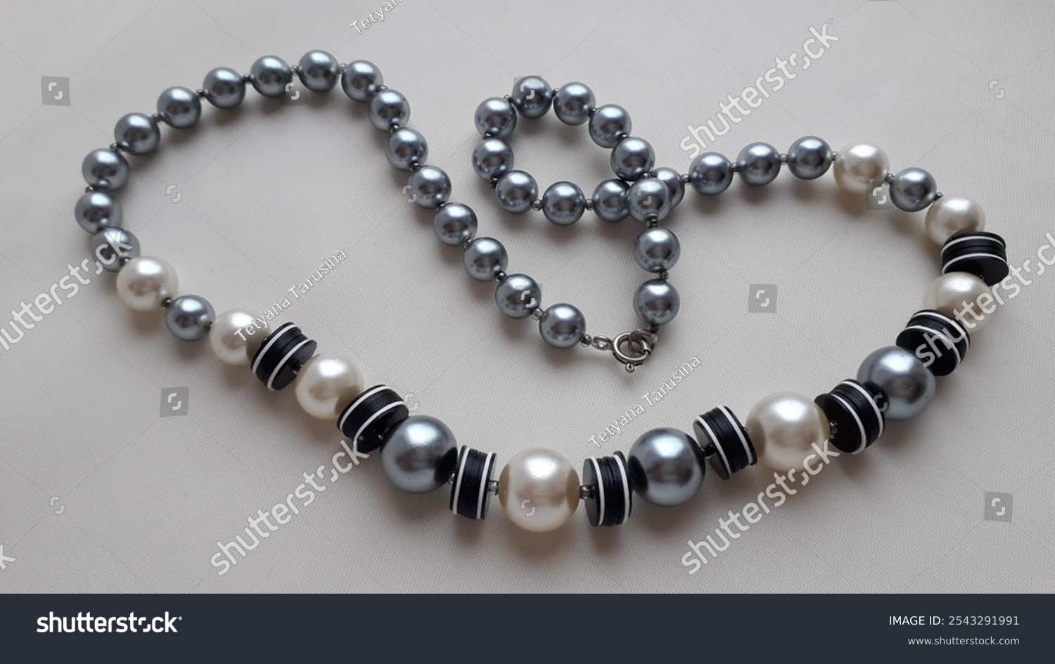 Vintage pearls  beads in necklaces  beads. Mother-of-pearl vintage jewelry. Pearl light gray beads.