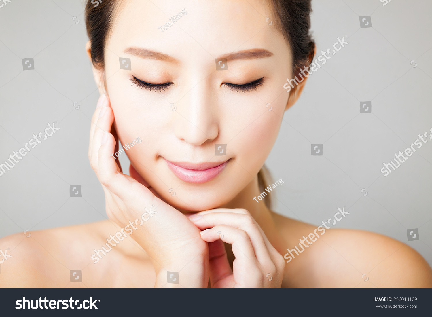 closeup smiling young  beautiful asian woman face 