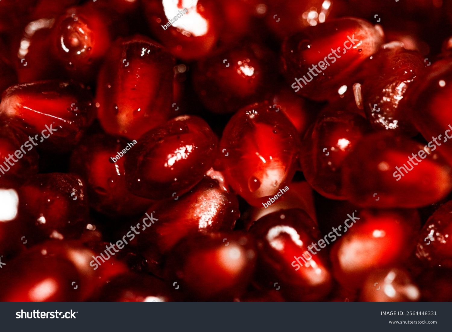 juicy fruit pomegranate close up. red and glossy fruit 