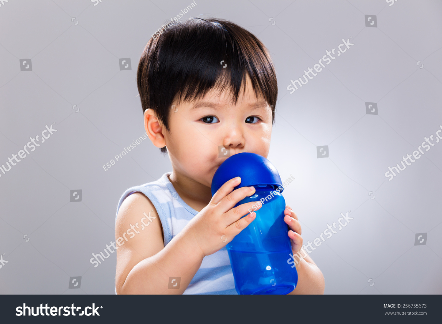 Asian baby drinking water