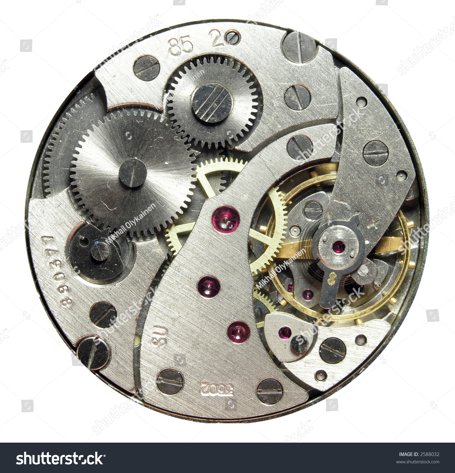 opened clockwork of round watch against white backgroud