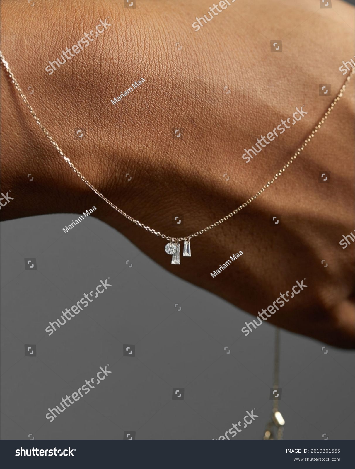 Unrecognizable young woman with a stylish  trendy  handmade necklace with an innovative  modern shape _ Jewelry model 