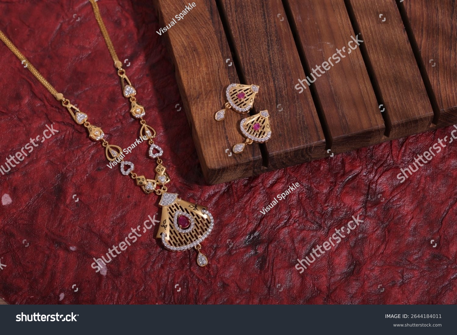 Elegant traditional Indian gold necklace set with intricate detailing  featuring a matching pair of ornate earrings  displayed on a Dark background — ideal for bridal or festive wear