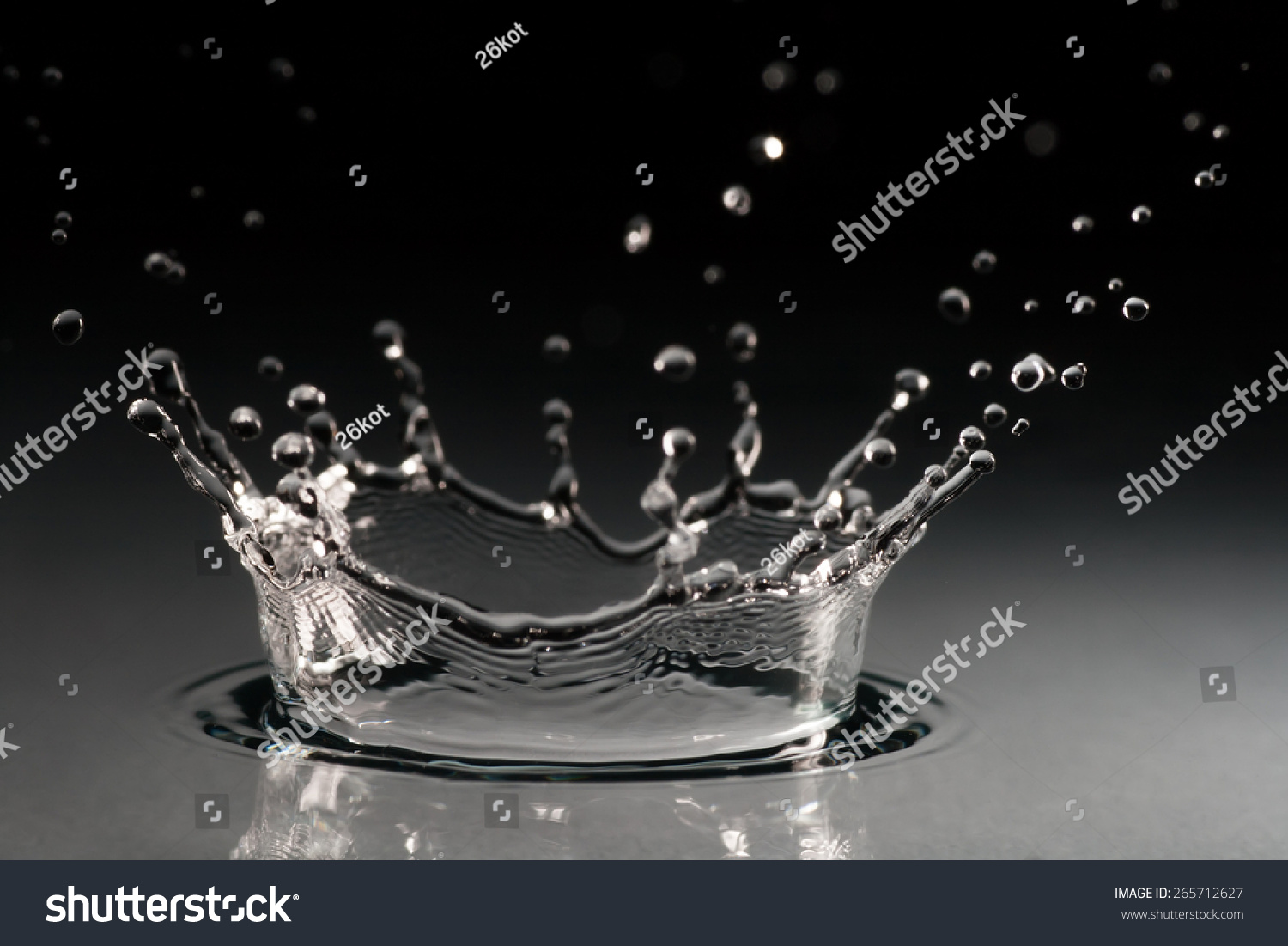 brilliant drops transparent water on black background