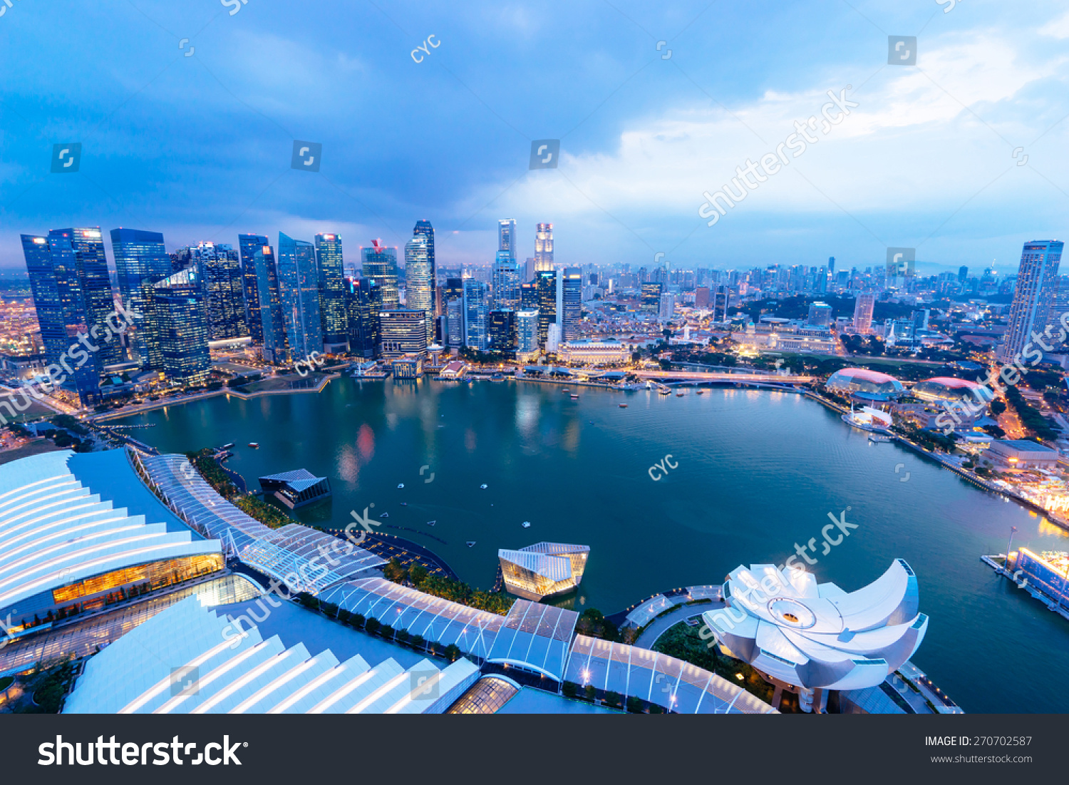 Singapore view with urban skyscrapers at night.