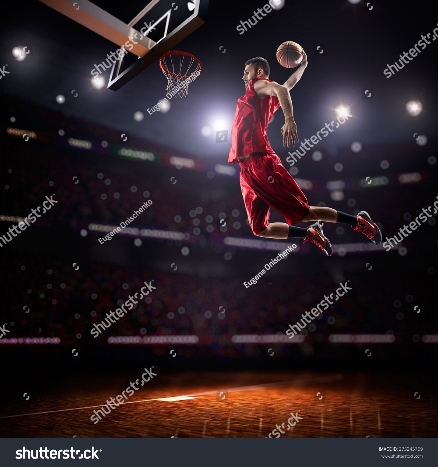 red Basketball player in action in gym
