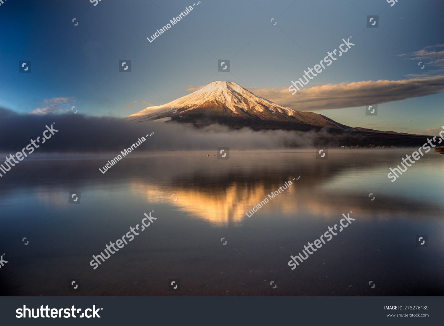 Mount Fuji reflected in Lake Yamanaka at dawn  Japan.