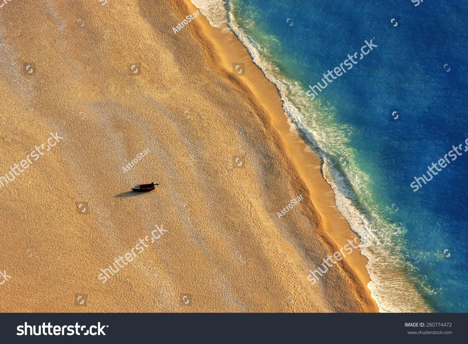 Lonely boat on a beach with aerial view.