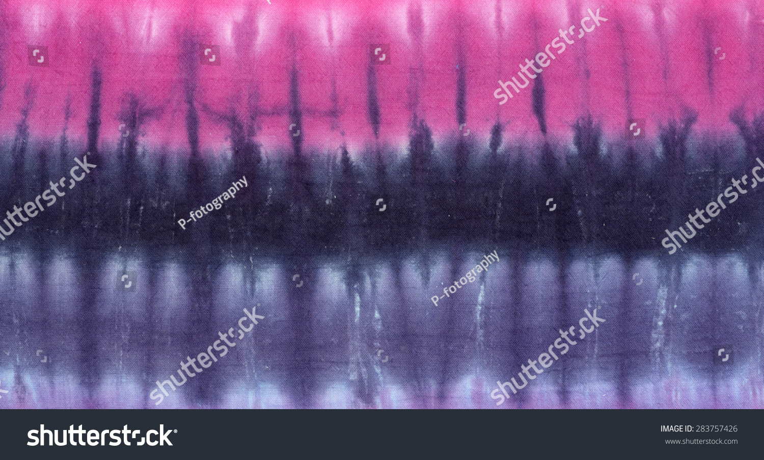 tie dyed pattern on cotton fabric for background.
